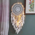 Handmade white dream catcher with feathers and warm LED lights against a dark green wall - White Vintage Style B with Lights
