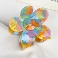 Floral acetate hair claw clip with colorful marble texture and five-petal flower design - Multicolor