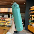 Mint green Tyeso insulated stainless steel water bottle with handle and flip lid - Spruce Green