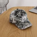 Detailed view of colorful rhinestones on a tie-dye baseball cap for fashion kids - Child Style (Adjustable) / Black