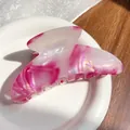 Pink marble acetate hair claw clip with pearlescent finish on a white decorative plate - Berry Red 11CM
