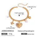 Gold stainless steel Cuban link bracelet with heart charms and pearls in macro view - Rhinestone Frame Heart Locket Style