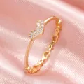 Anello a cuore in oro rosa con cristalli micro-pave e fascia a cuori traforati - Anello In Oro Kc 7390 / Taglia unica
