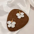 Elegant minimalist white flower petal drop earrings with a golden pearl bead design - Champagne Center Bead White Petal Style (E6057-1/Champagne)
