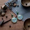 Bohemian mandala drop earrings with emerald beads and silver circular pendants - Mandala Round Emerald Style (E3502-1)