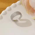 Close-up of silver adjustable ring with multi-row micro-pave crystals on white tray - Adjustable Open / Silver Multi-row Pavé Cubic Zirconia Style (H)