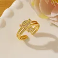 Close-up of gold double-layer open ring with sparkling pavé micro-inlaid girl motif - Adjustable Open / Gold Candy Shape Pavé Style (S)