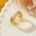 Macro shot of gold-plated ring featuring pave set micro-zirconia in rectangular top - Adjustable Open / Gold Rectangular Full Diamond Style (Y)
