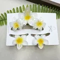 5-piece Plumeria hair clip set with white and yellow flowers for beach vacation styling - Three Frangipani Flowers White Background With Yellow Center (including Card)