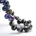 Macro shot of 4/6/8mm K9 faceted teardrop glass beads with iridescent AB coating - Rose Red Half Gun Black / 6mm (approximately 87 Beads Per Strip)
