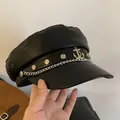 Classic black PU leather newsboy hat with silver anchor emblem and metallic chain accent - One Size / Anchor Chain Black