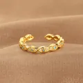 Vintage golden evil eye open ring featuring turquoise stones and white zircon accents - Continuous Evil Eye Style (JZ038) / Gold