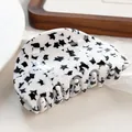 Minimalist white acetate hair claw clip featuring black star pattern with polished finish - 7.5cm / Star Print 7.5CM