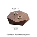 Silver feather and crown rings displayed on hexagonal walnut wood stands in 4.5cm and 5.5cm - Walnut Multi-faceted Diamond Board