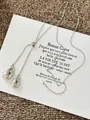 Détail du collier argenté en Y avec pendentifs en goutte d'eau et fermoir coulissant - Collier Réglable Goutte d'Eau / Argenté