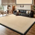 Beige ice silk cooling mat for living room featuring elegant black scalloped borders - Quiet Courtyard