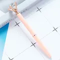 Pink metal ballpoint pen with a large rose gold crystal diamond on a stylish background - Pink (Rose Gold Parts)
