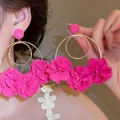 Oversized gold hoop earrings with vibrant pink fabric flowers for a bold fashion statement. - Rose Red Flower Gold Circle (37#)