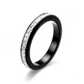Macro detail of black ceramic band ring with channel set sparkling white square zircons - US 5 / Black - Spinning - Square Zirconia Ring
