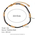 Minimalistische 18K vergulde roestvrijstalen enkelband met zwart koord en 25 kralen - Zwart Touw Enkelbandje met Gouden Stalen Kralen