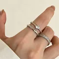 Three-piece stackable silver ring set with opal sunflower and blue butterfly accents - Simple Stacking Ring (White K 12291)