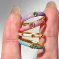 Golden enamel ring set with butterfly and flower motifs featuring colorful gemstones - 4Pcs Colorful Enamel Gemstone Rings