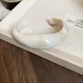 Minimalist open bangle in cream marble resin with a smooth polished geometric finish - Off White