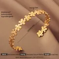 Detailed specs of 18K gold plated stainless steel floral cuff with 62mm inner diameter - Gold Open Flower Style
