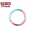 Detail view of rainbow gradient G23 titanium seamless clicker ring with ASTM F136 standard - Rainbow