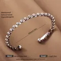 Adjustable silver finish stainless steel open bangle featuring sphere details - Silver Sphere Style