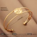 18K gold plated stainless steel open bangle featuring a textured diamond-patterned disc - Gold Lace Flower Style