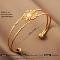Adjustable 18k gold plated stainless steel daisy bangle with a white pearl center - Gold Daisy Artificial Pearl Style
