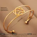 Exaggerated 18k gold plated stainless steel open bangle with hollow knot and hammered texture - Gold Flower Shaped Style (37)