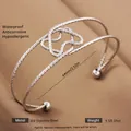 Silver adjustable stainless steel open bangle with hollow knot and hammered texture - Silver Flower Shaped Style (38)