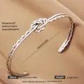 Silver open knot cuff bracelet in 304 stainless steel with a twisted rope texture finish - Silver Double Layer Knot Texture Style
