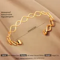 Adjustable 18k gold plated stainless steel wave bangle with hollow minimalist design - Gold Round Texture Style (72)