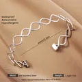 Silver adjustable wave open bangle in 304 stainless steel with matte and polished texture - Silver Round Texture Style (73)
