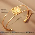 Adjustable 18k gold plated stainless steel open bangle with central flower design - Gold Five Petal Flower Style