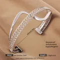 Exaggerated silver 304 stainless steel open cuff bracelet with hollow spring design - Silver Z-Shaped Threaded Style