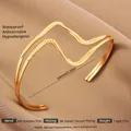 Exaggerated 18k gold plated stainless steel open bangle with double line wave design - Gold Z-Shaped Single Side Texture Style