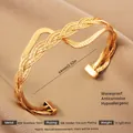 Exaggerated 18k gold plated stainless steel open cuff bracelet with woven design - Gold Z-Shaped Braid Texture Style