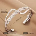 Silver braided stainless steel open bangle with smooth spherical ends and 18k finish - Silver Z-Shaped Braid Polished Style