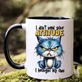 Detail of 11oz ceramic mug with funny cat illustration on mossy outdoor background - Blue Cat Attitude Style (6886-9)