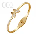 Close-up of gold stainless steel butterfly bangle with pavé crystals and spring hinge - Pave Butterfly Zirconia Hanging Chain Style (002)