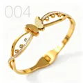 Close-up of gold butterfly cuff bracelet with frosted texture and sparkling zircons - Hollow Line Frosted Butterfly Pave Style (004)