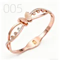 Detail of rose gold butterfly bangle with hollow wave frame and sparkling zircons - Rose Gold Hollow Wavy Butterfly Style (005)