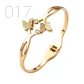 Macro detail of gold-plated butterfly bracelet with matte finish and zircons - Double Frosted Butterfly Point Diamond Style (017)