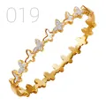 Detail of gold stainless steel butterfly bracelet with mother of pearl and zircons - Mother of Pearl Pave Butterfly Style (019)