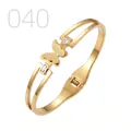 Elegant gold butterfly stainless steel bangle with sparkling rectangle zircon stones - Double Row Hollow Frosted Butterfly Zirconia Style (040)