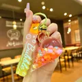 Quicksand ice cream keychain with colorful beans and liquid in a floating bottle charm - Ice Cream Colorful Bead Style / Orange
